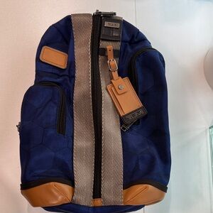 Tumi Navy and Tan Backpack with Silver Details